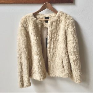 Faux fur jacket with pockets